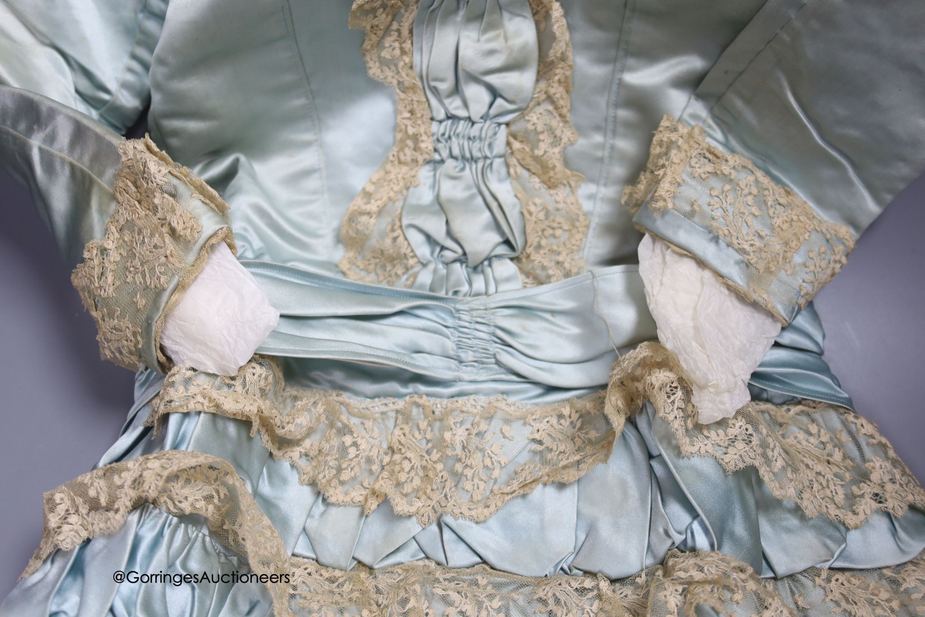 A Victorian silk and lace bordered dress